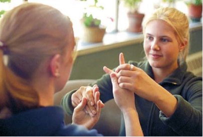 An ASL conversation between an interpreter and a student